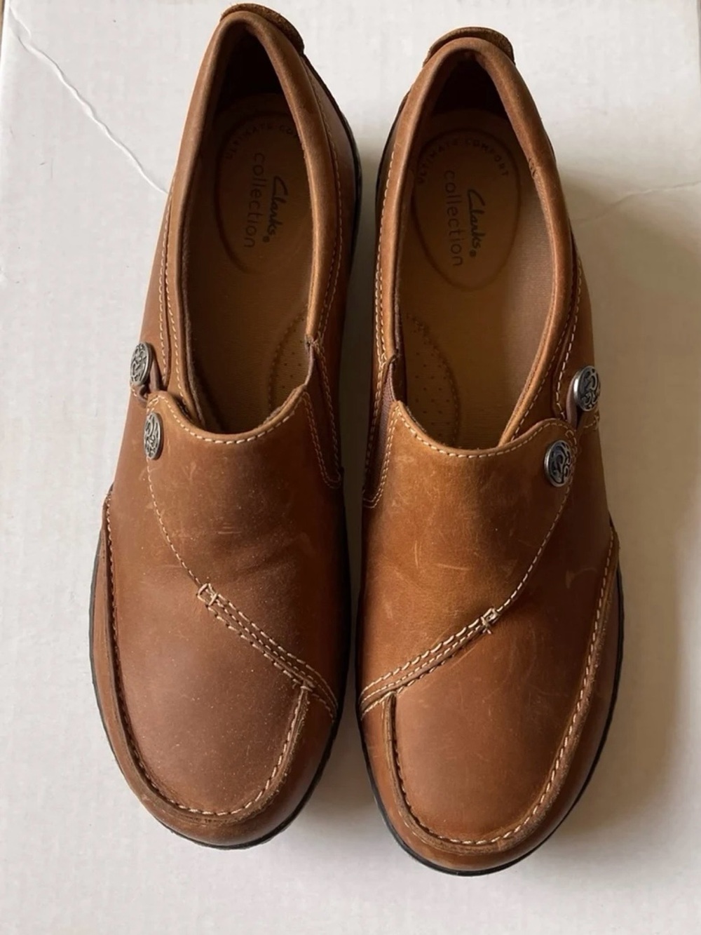 Clarks Women's Brown Leather Slip-On Loafers with Button Accents